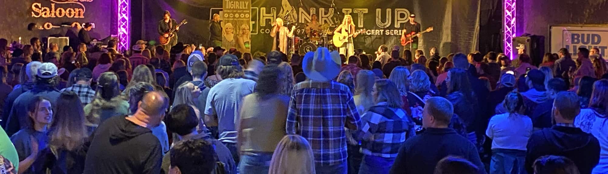 country concert with fans wearing cowboy hats Lehigh Valley
